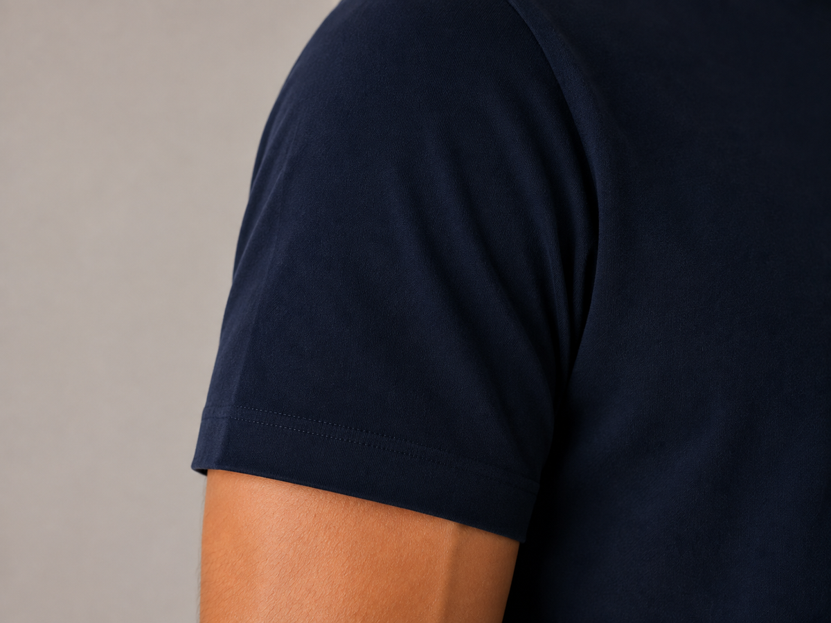 Men's navy blue crew neck t-shirt, fabric close-up of 240 GSM Supima stretch jersey