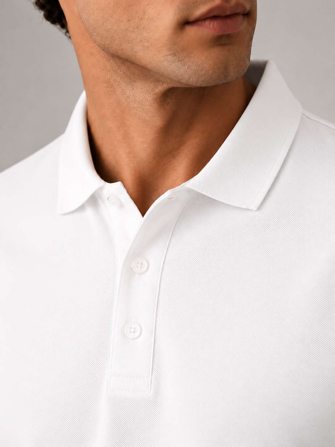 Men’s chalk white polo shirt, flat lay front view, reinforced anti-curl collar finish